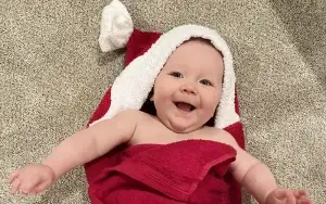 baby in a Hooded Towel for Christmas